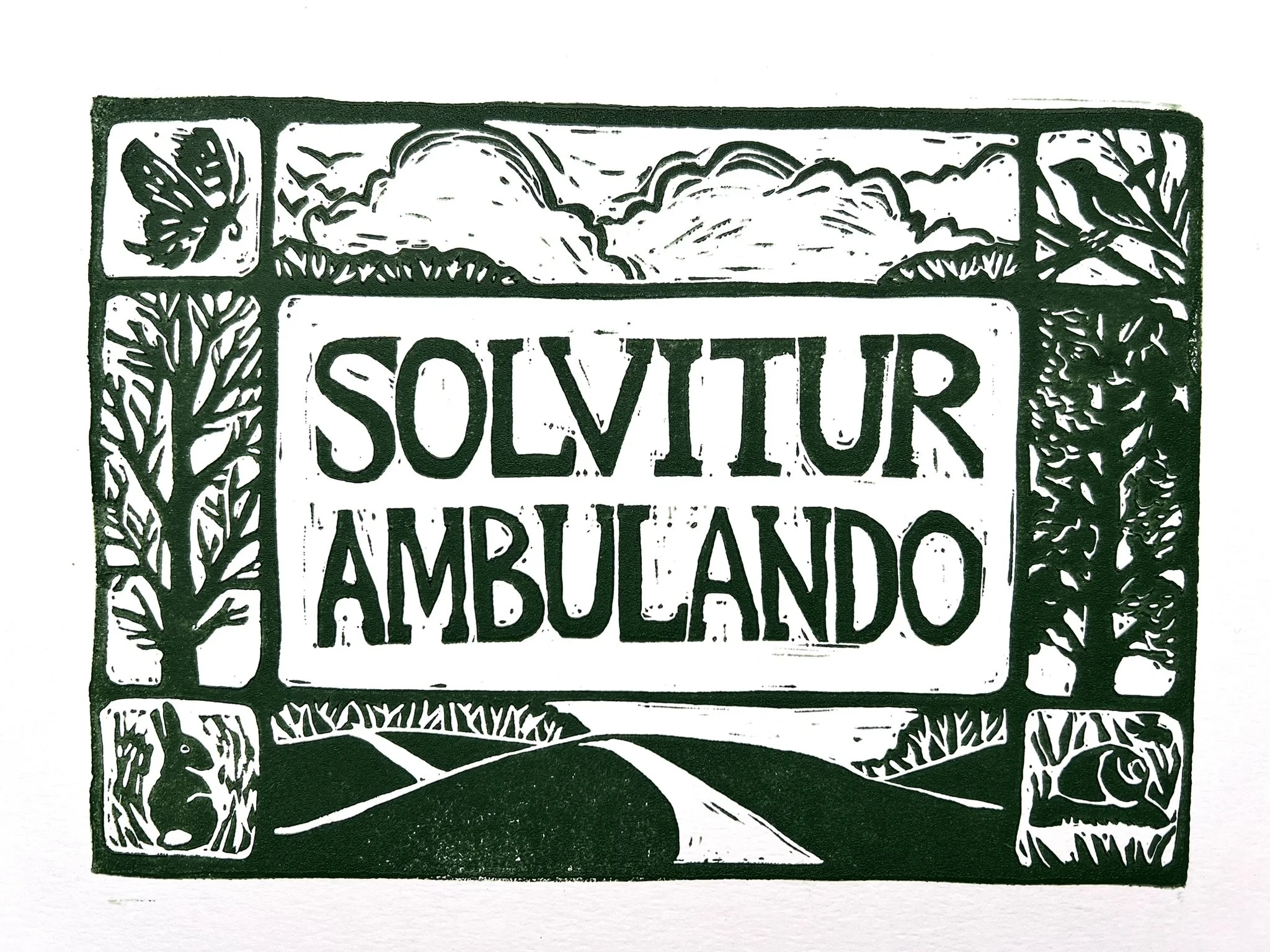 Solvitur Ambulando linocut block print
