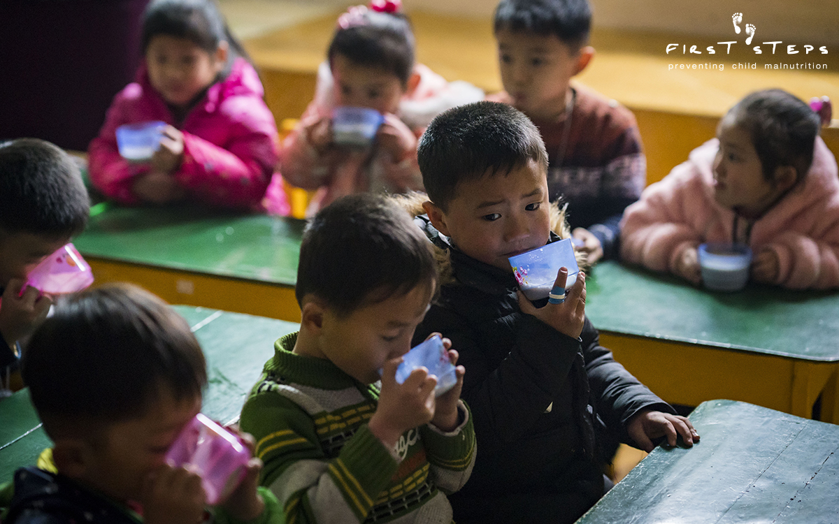 Each of the 250 children attending the Poha Kindergarten receive a morning cup of soymilk.