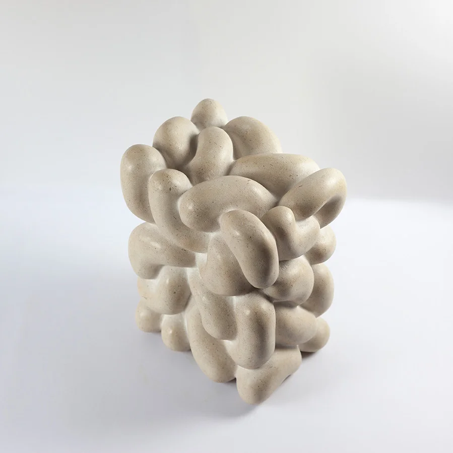 The making of stone carving 'Feedback Loop'.