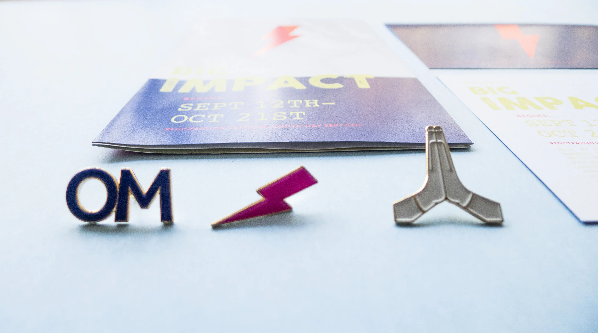 Logo pins for program participants, collaboration with Felt Good Co.