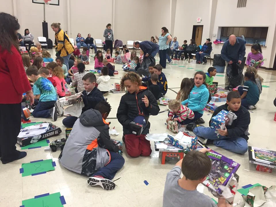 Children's & Youth Christmas Party - Dec. 21, 2016 We partnered with Toys for Toys to provide over 75 students (youth and children) with multiple Christmas presents. We were also blessed to give away a box of food to each family!