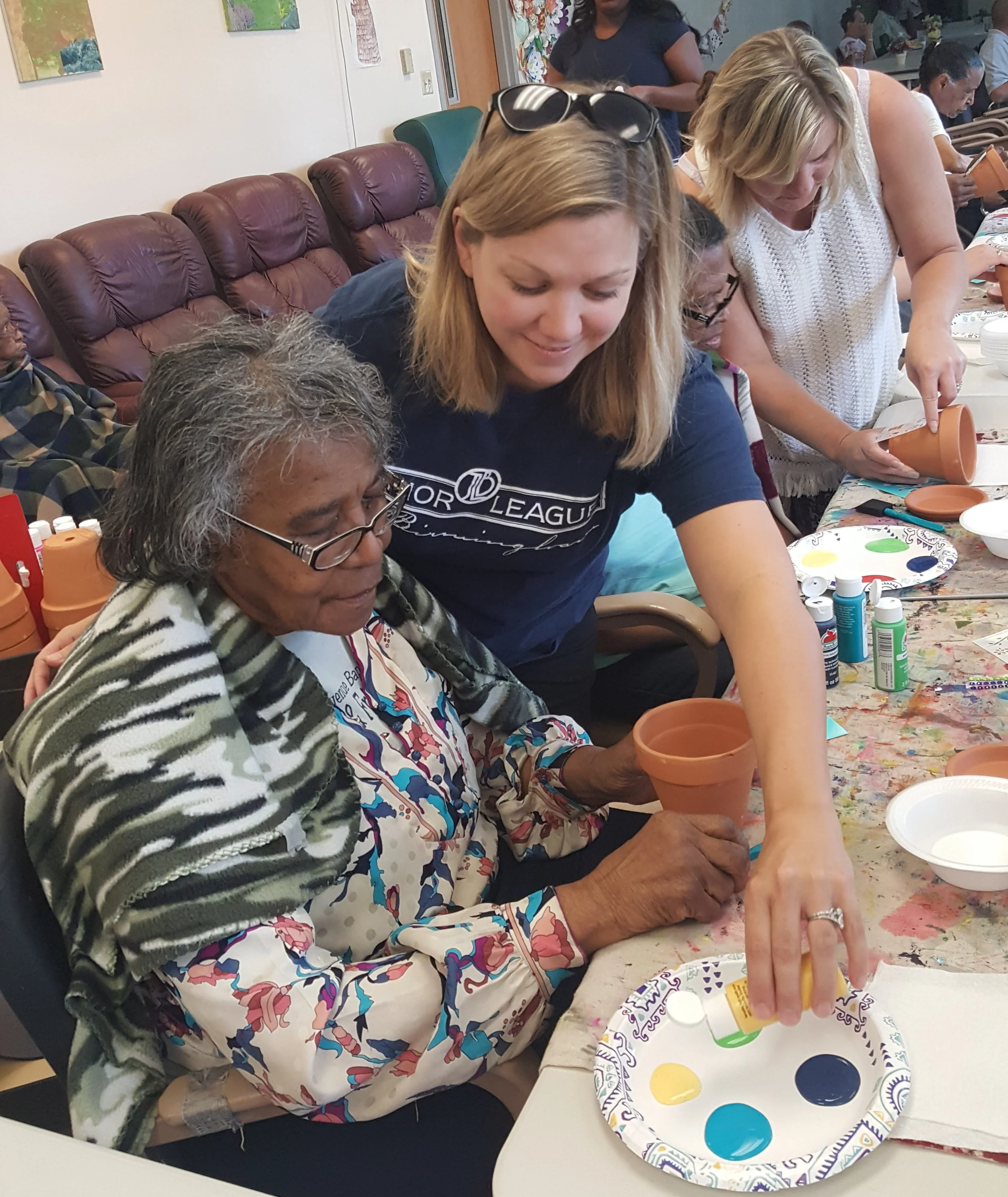 Members of the Junior League of Birmingham enjoying an afternoon of painting with our clients. Click the Facebook icon to check out more pictures and activities on our Facebook page!