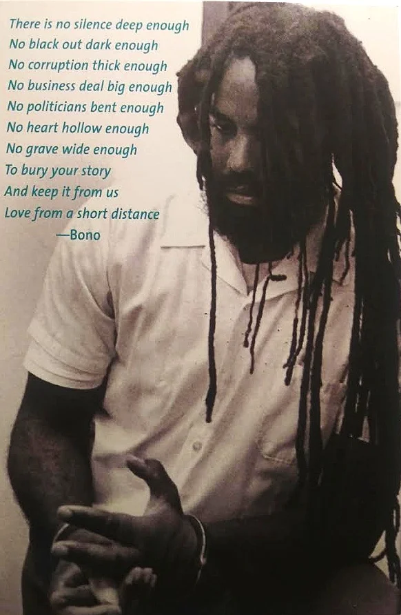 MUMIA POSTCARD WITH BONO QUOTE (50)