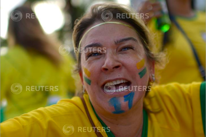  A supporter of presidential candidate Jair Bolsonaro reacts during a pro-Bolsonaro demonstration in Rio de Janeiro, Brazil September 29, 2018. REUTERS/Lucas Landau 