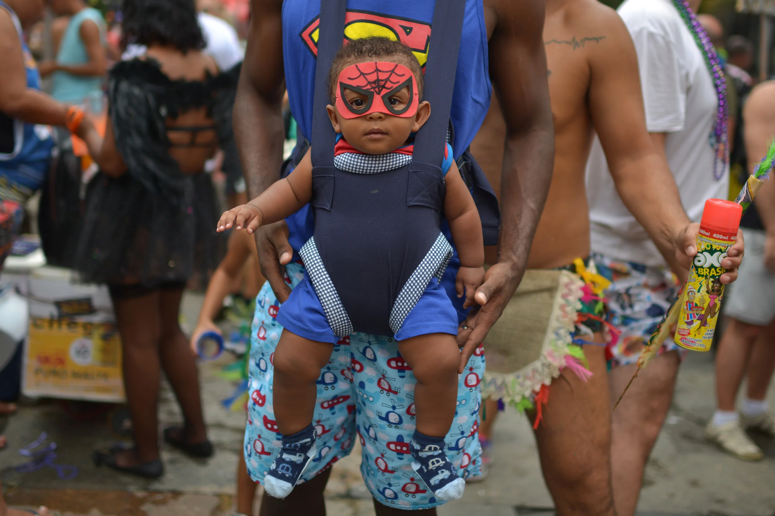 A child takes part in the annual block party known as "Cordão do Boitatá", during Carnival festivities in Rio de Janeiro, Brazil March 3, 2019. REUTERS/Lucas Landau