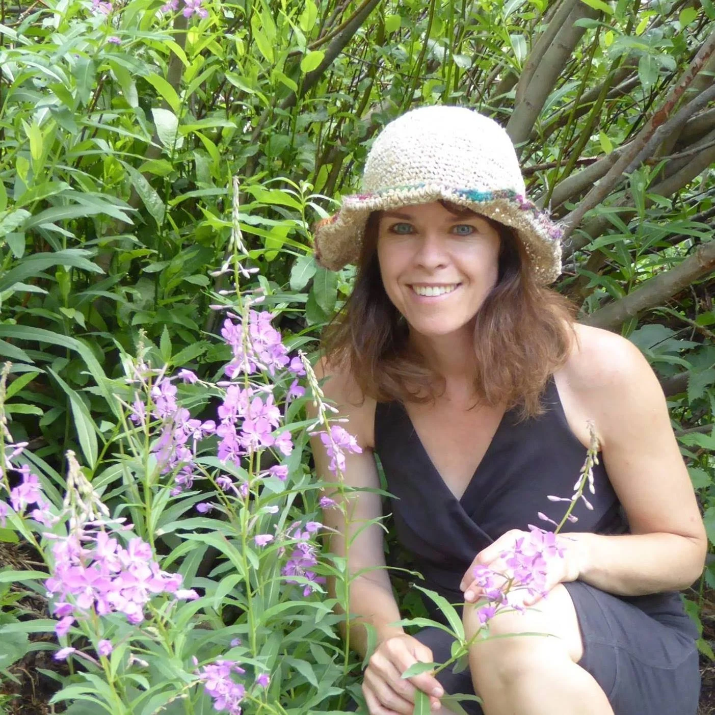 Rebecca+with+fireweed.jpg