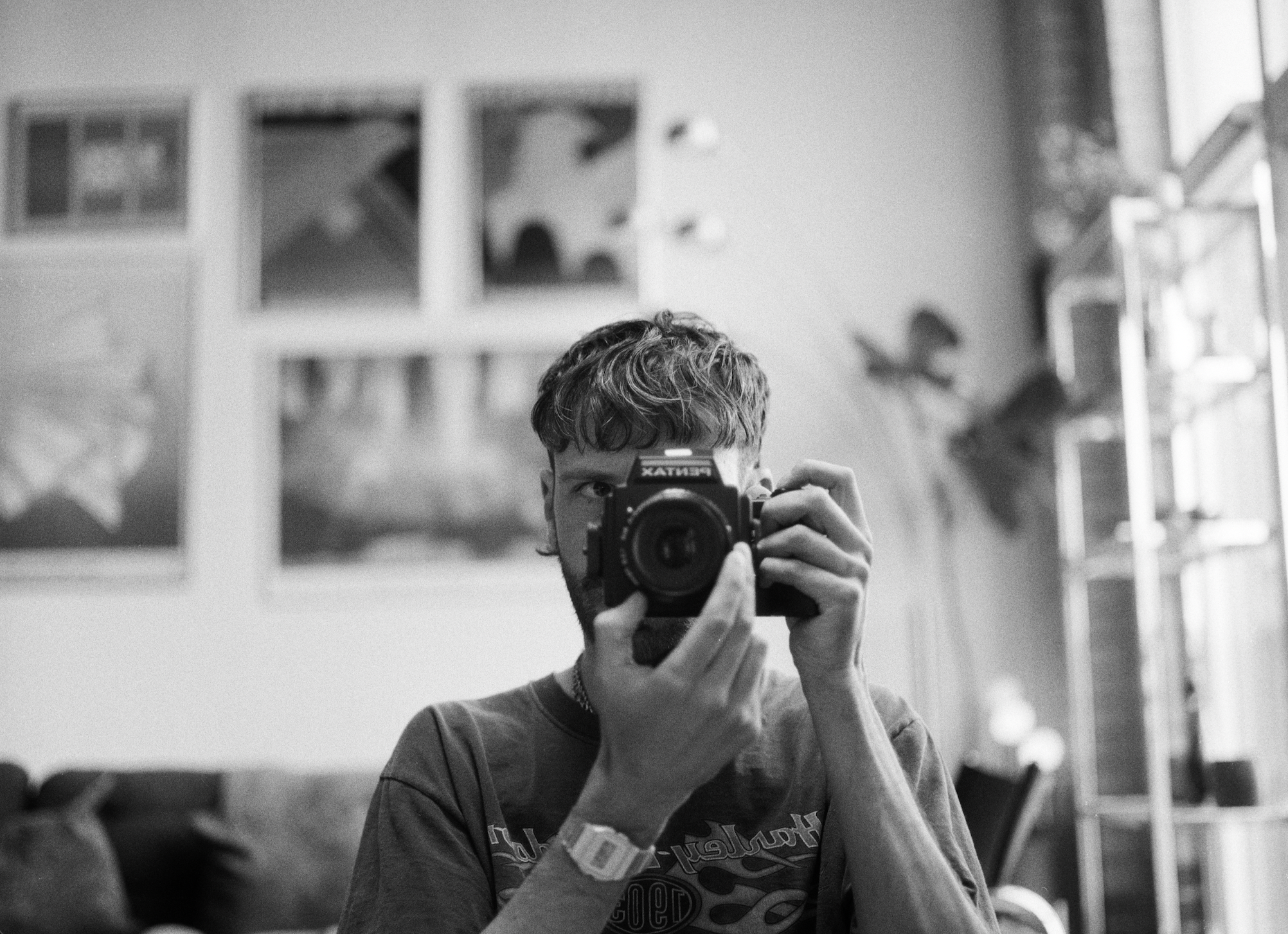 self portrait of toronto based cinematographer Shae Paterson, shot with a Pentax 645 Film camera in black and white film.