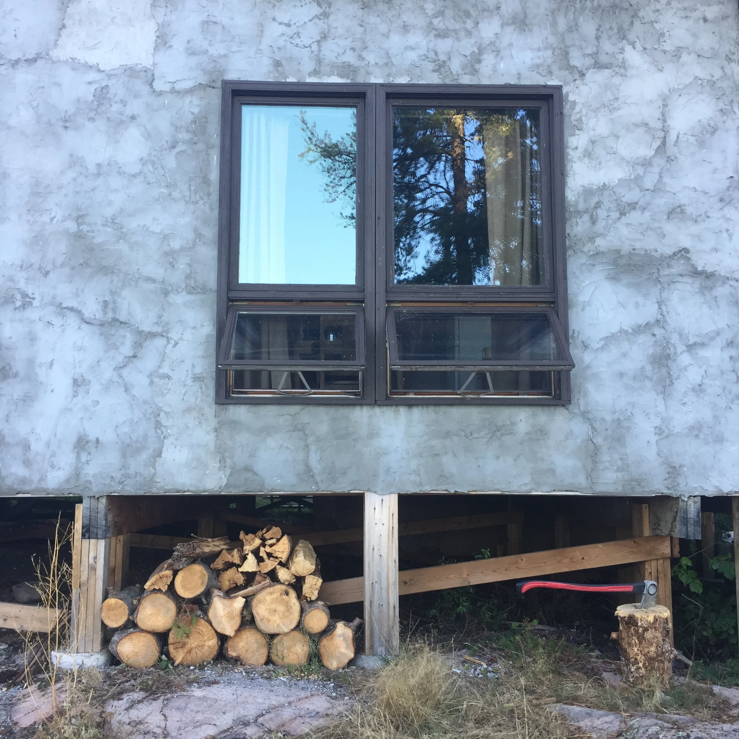 Cross-ventilation and firewood stack.