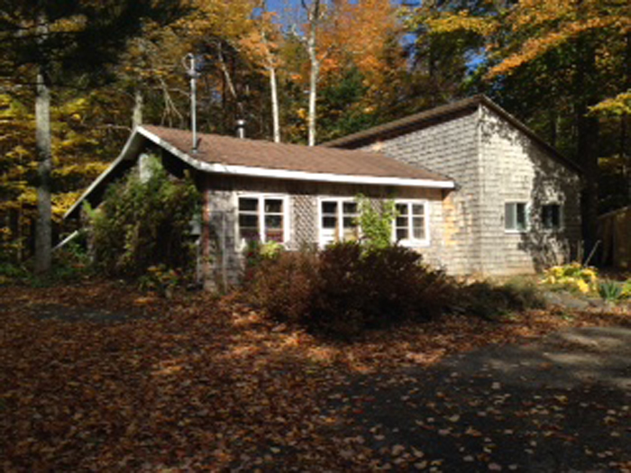 The studio/gallery has expanded several times, the last expansion being Judy's clay studio with space for display, kiln area, and wheel area.