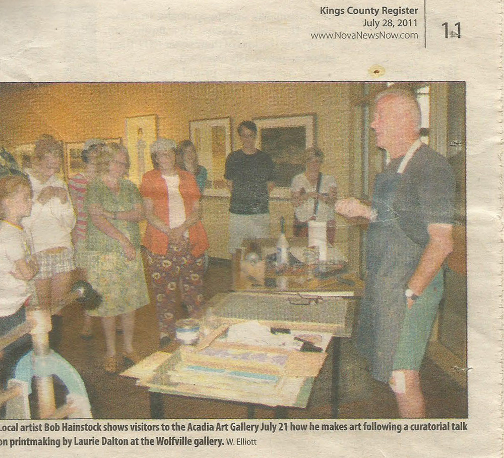 Bob is in mid-summer shorts as he begins a demonstration of printmaking techniques to support the Acadia Art Gallery's exhibition of prints from its permanent collection.