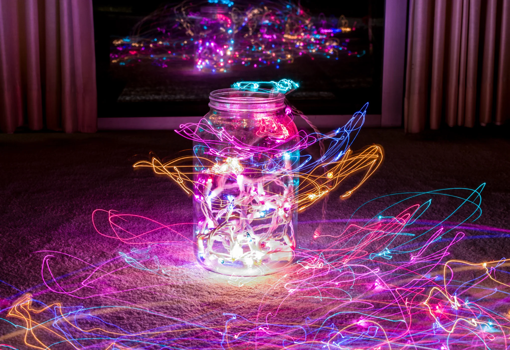 Christmas lights in a jar in my home. 