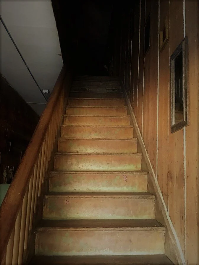 Stairs going up to the 2nd floor