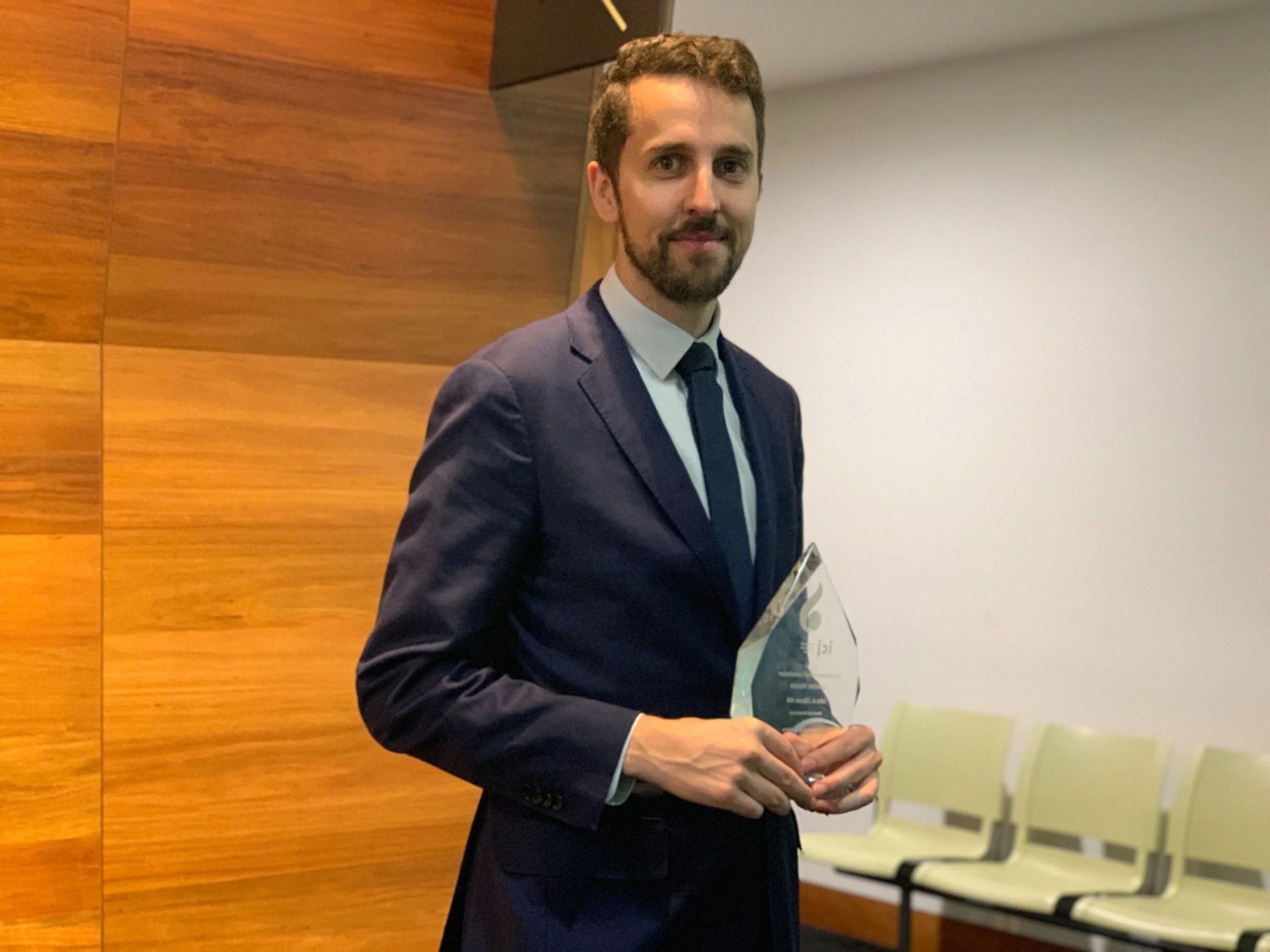 David Burke wins John Gibson Award for work defending the rights of people seeking safety