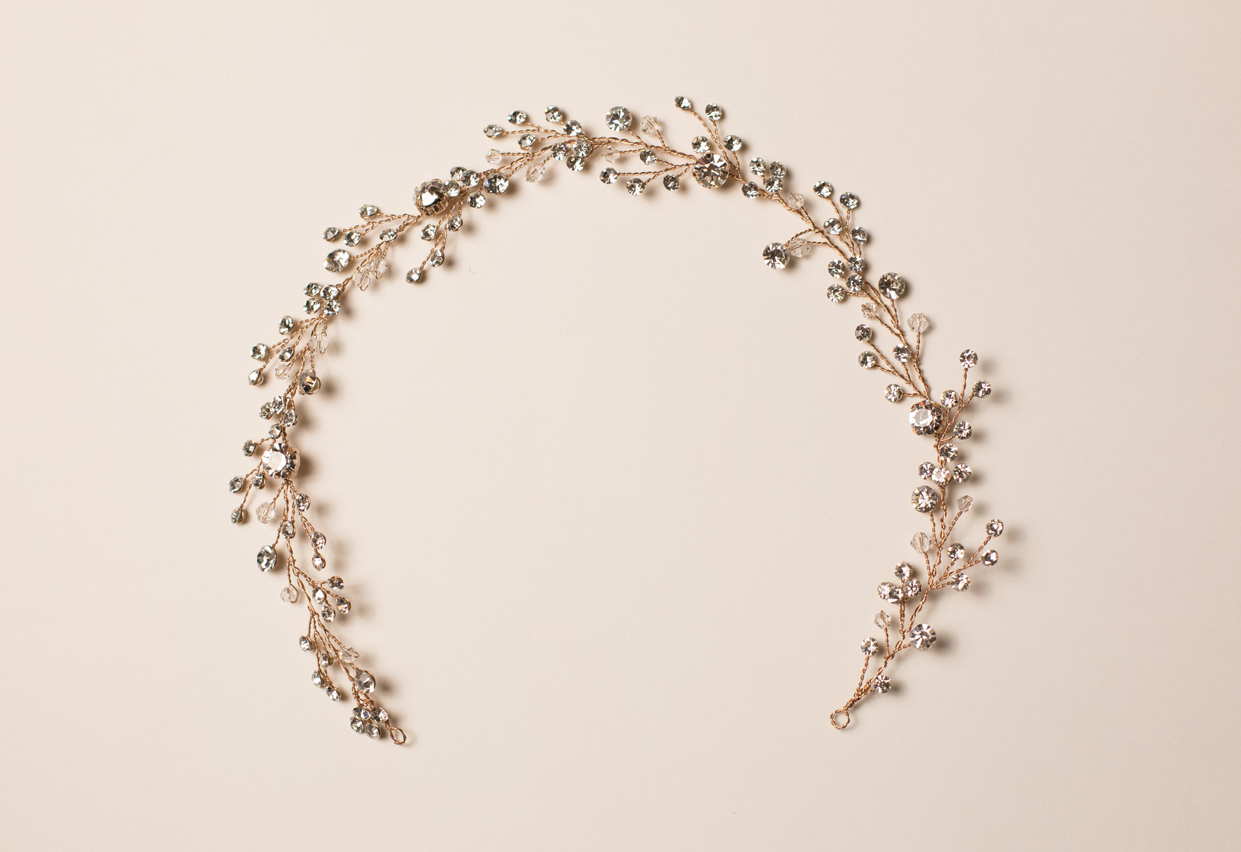 Amber (Rose Gold), a delicately braided Swarovski crystal vine, worn as a hair piece or belt. 