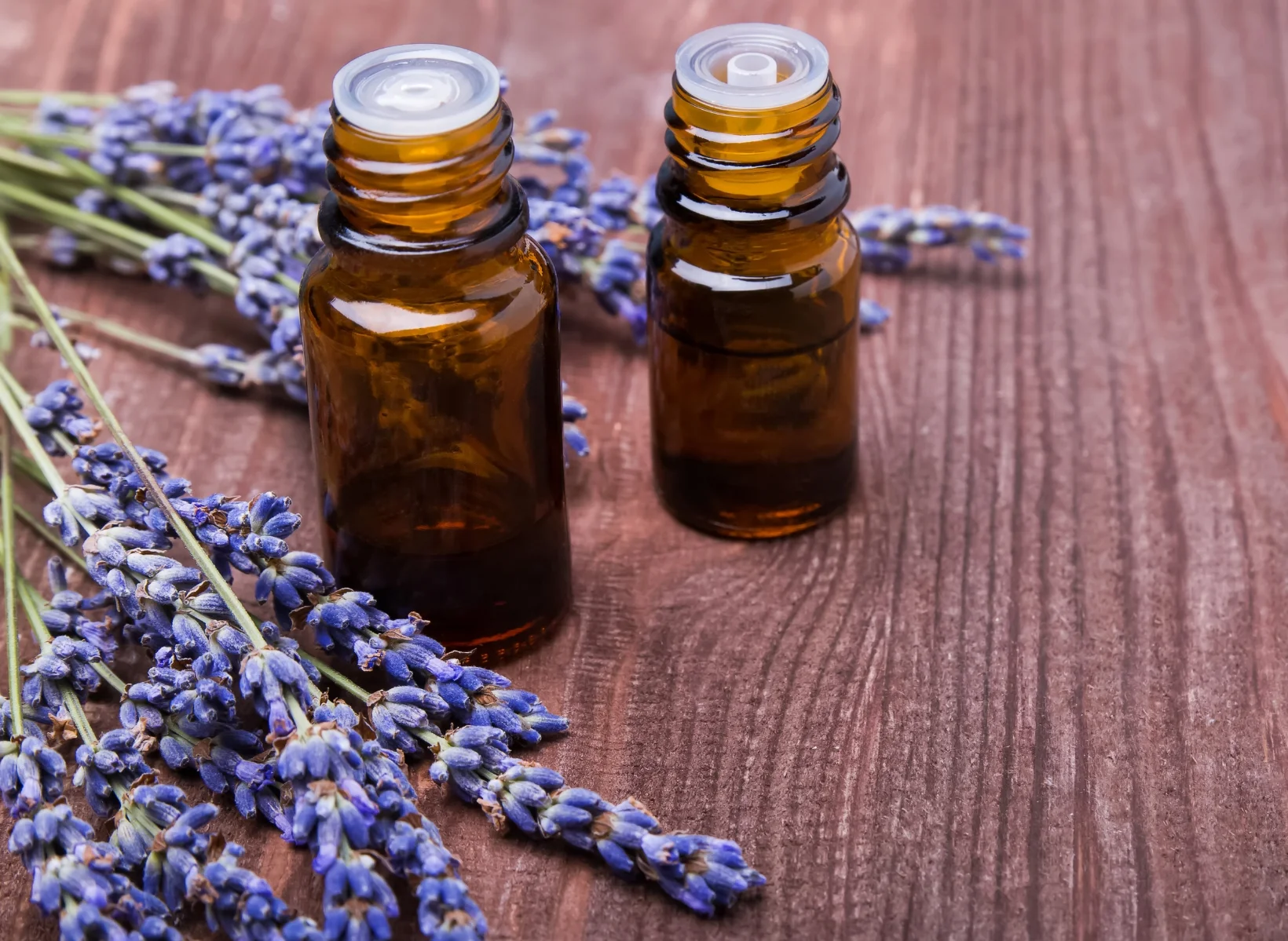bigstock-Two-Bottles-Of-Aroma-Oils-And--96725954.jpg