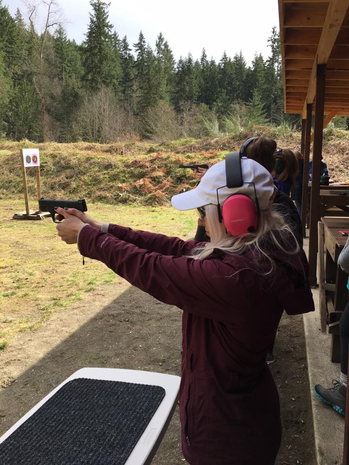 woman handling pistol