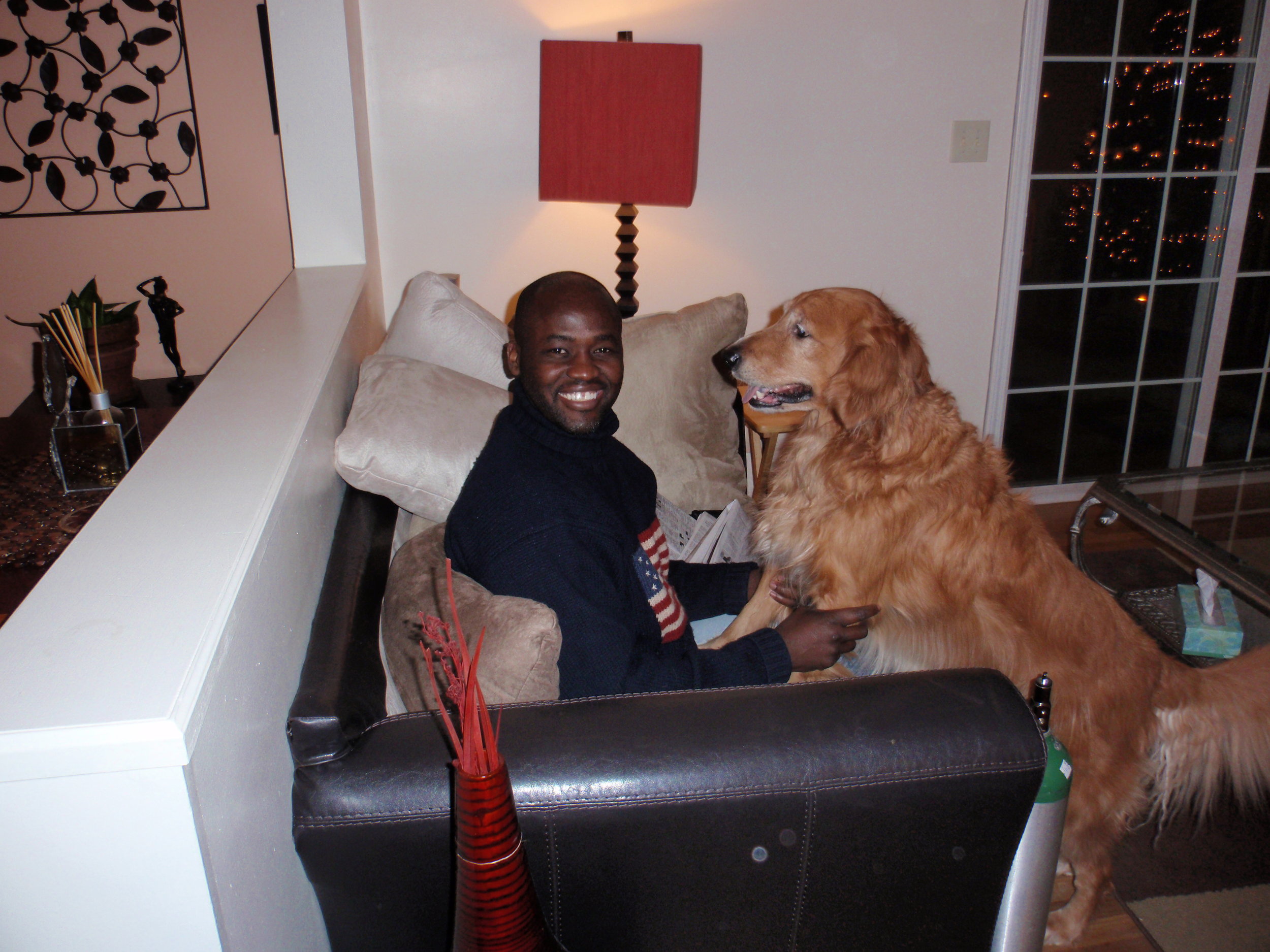   I'm having a man-to-dog conversation in September of 2011 with my favorite Golden Retriever, Odie. From 2011 to 2014, while working on my first book, I lived in my cousin, Kafui's lovely home.        