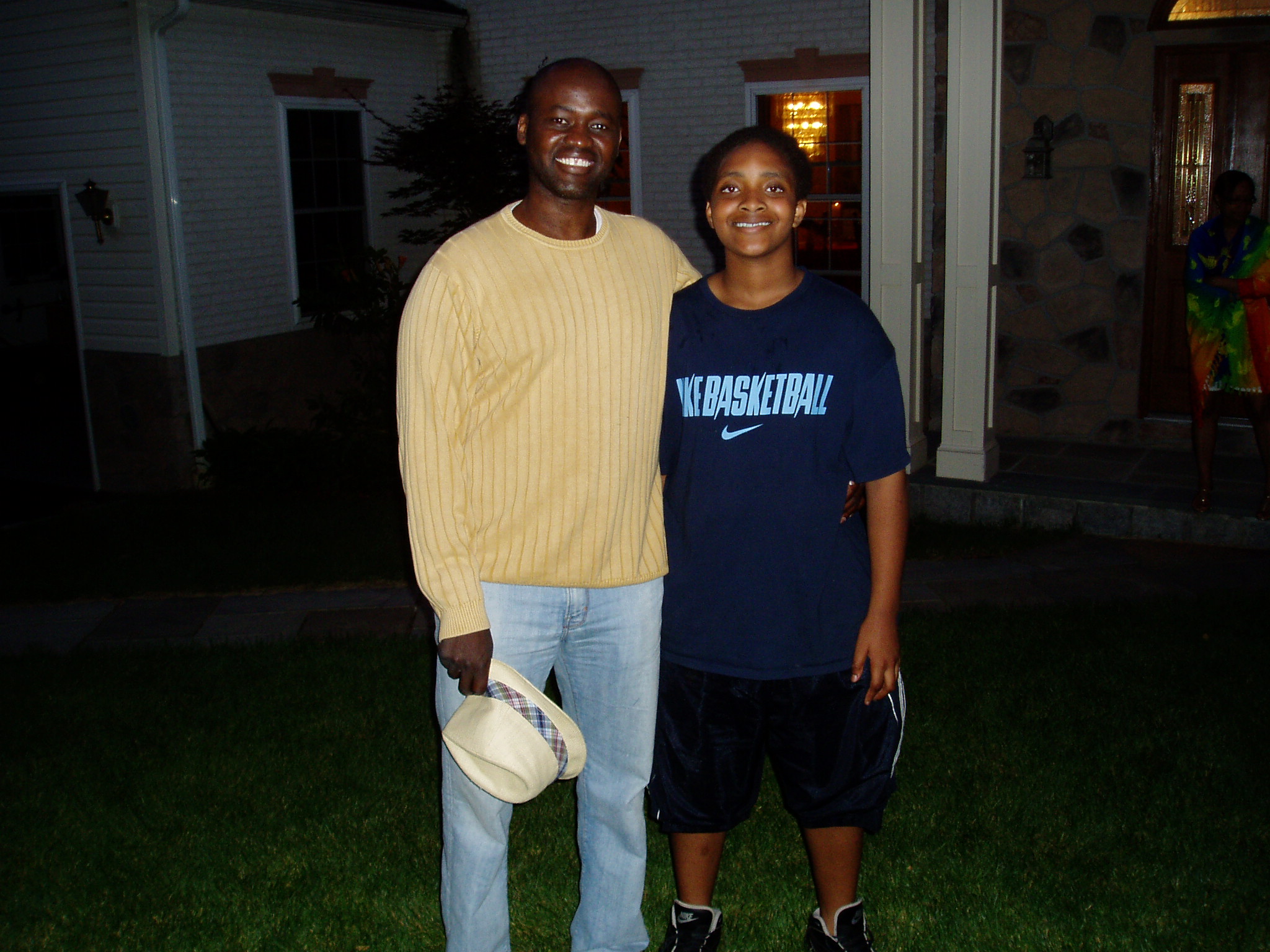   I'm with my second cousin, Ezekiel Nana Demasio -- Kafui's only child -- in front of their home. His middle name came in honor of my late brother.    