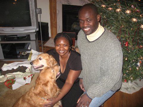   Christmas '08: My cousin, Dr. Kafui Demasio, and her rambunctious Golden Retrievers: Odysseus and Cecelia.  