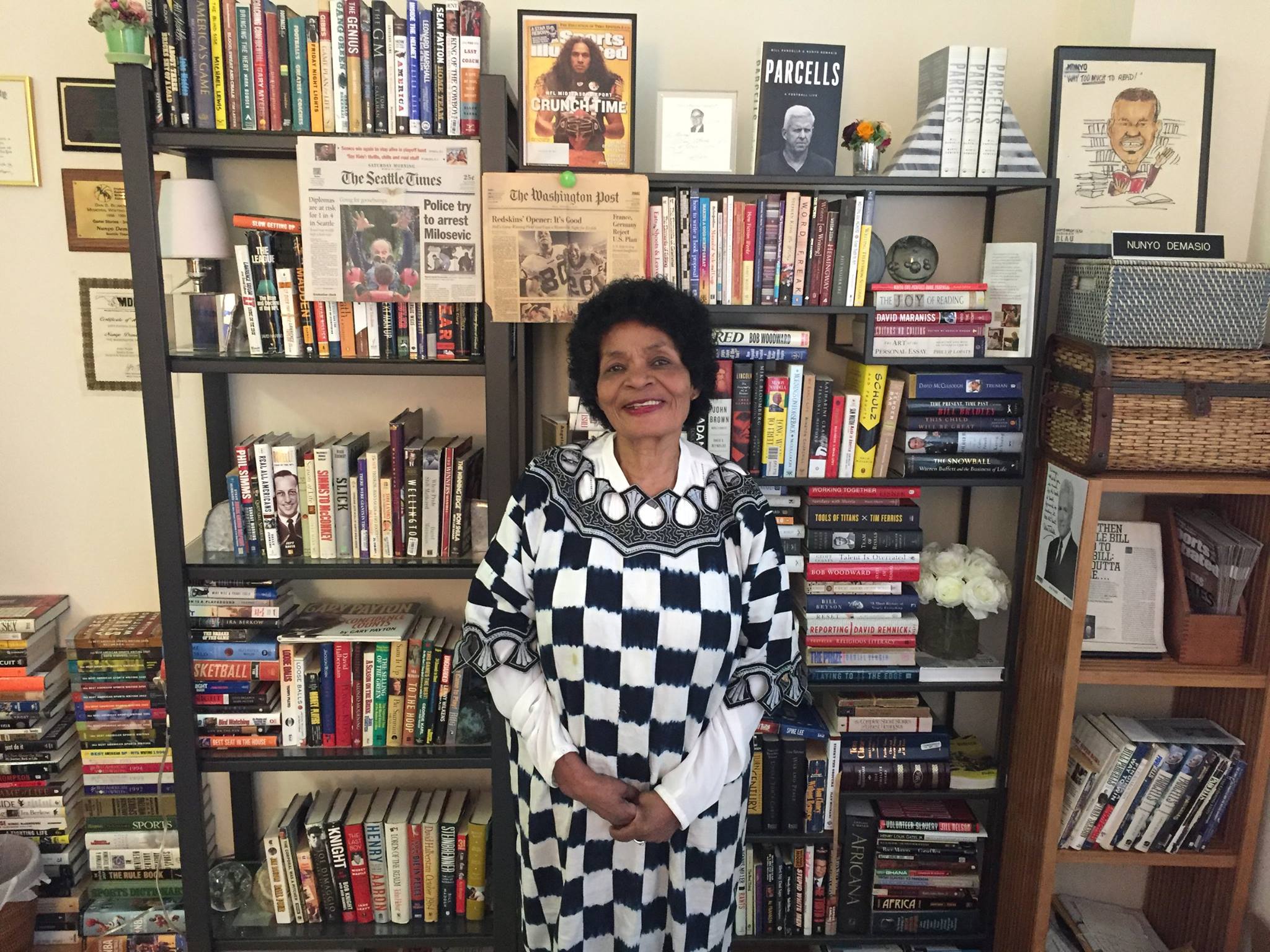  Queen Dorcas in front of my book shelf during summer 2017.  