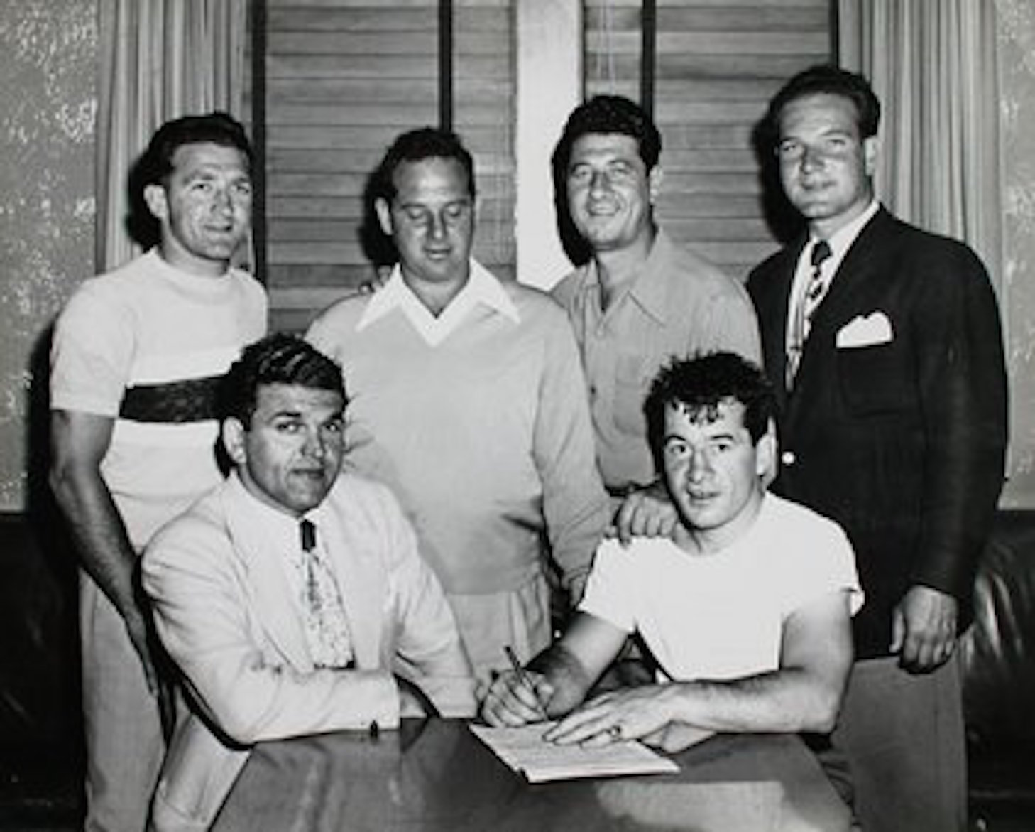Ralph Tribuani with middleweight champion Rocky Graziano. The Wilmington promoter helped restore Graziano’s boxng career after the boxer failed to report a bribe attempt.