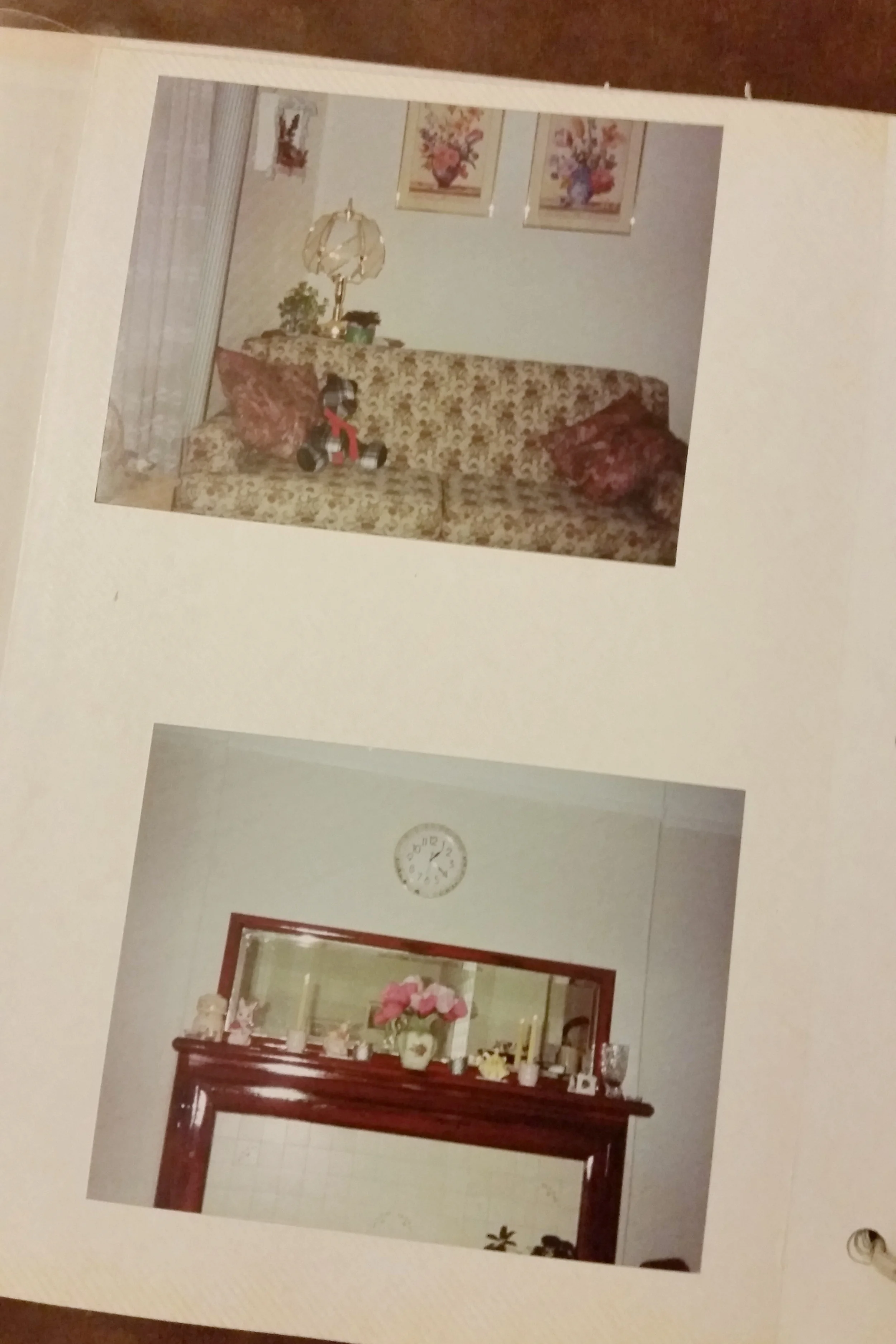 My thrift store love seat and faux fireplace, a teddy bear from my first entrepreneurial venture.