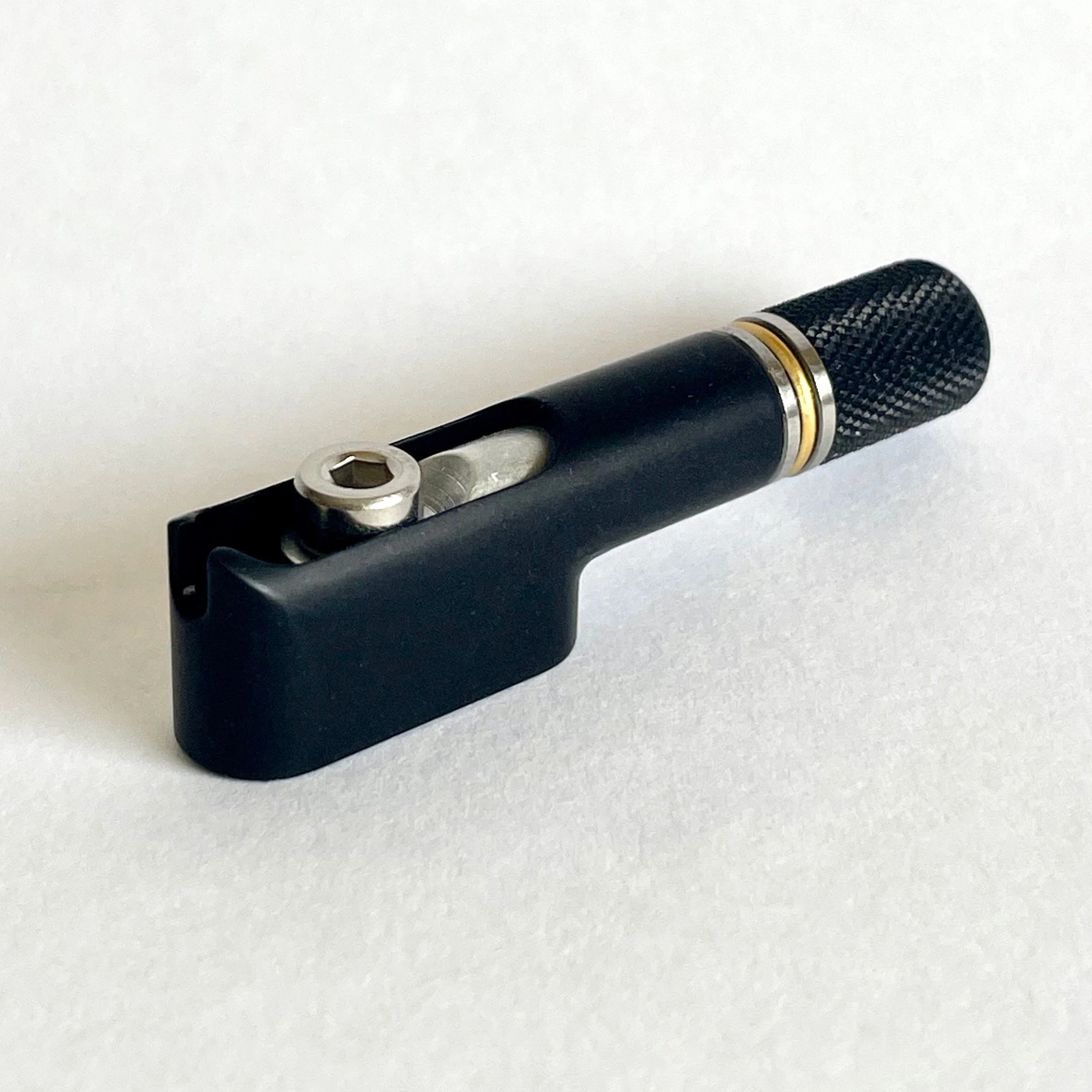 Wrap-lock linear tuning machine