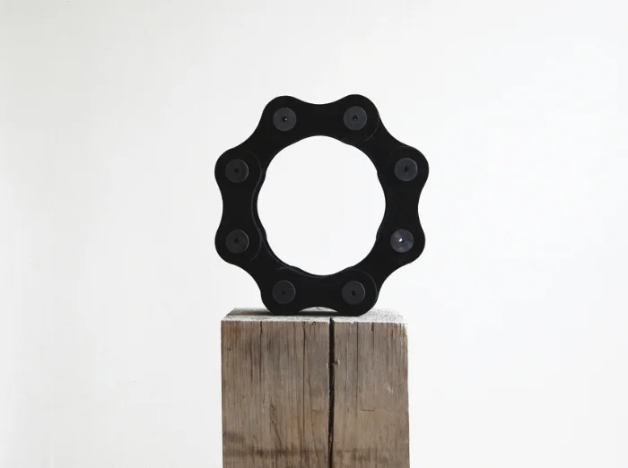    Circular Black Chain (previous Triangle Black Chain),&nbsp;   2012 |&nbsp;Felt, wooden spools and   recycled wood beam  &nbsp;|&nbsp;Dimensions variable  