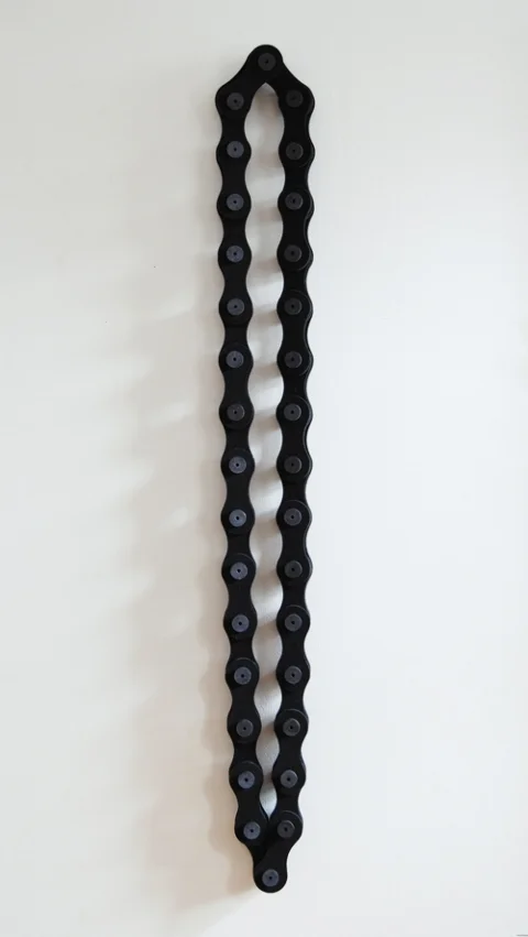    Black and Gray Chain,&nbsp;   2012 |&nbsp;Felt and wooden spools |&nbsp;Dimensions variable &nbsp; 