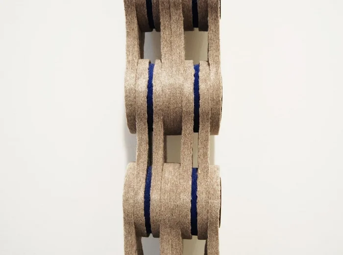   Detail>>    Gray and Electric Blue Double Chain,&nbsp;   2012 |&nbsp;Felt,&nbsp;vintage wood spools and   recycled wood beam  &nbsp;| Dimensions variable  
