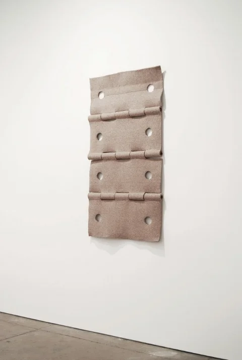   Standing Hinge  , 2012 | Felt, thread and wood poles | Dimensions variable  