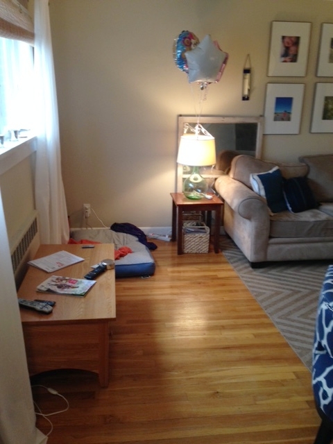 Since this room was originally two spaces, it's rather lopsided with one end of the space being emptier than the other. This is usually where we drop the groceries. The coffee table is under the window here, in limbo, in the midst of my post-Christmas rearranging frenzy. 
