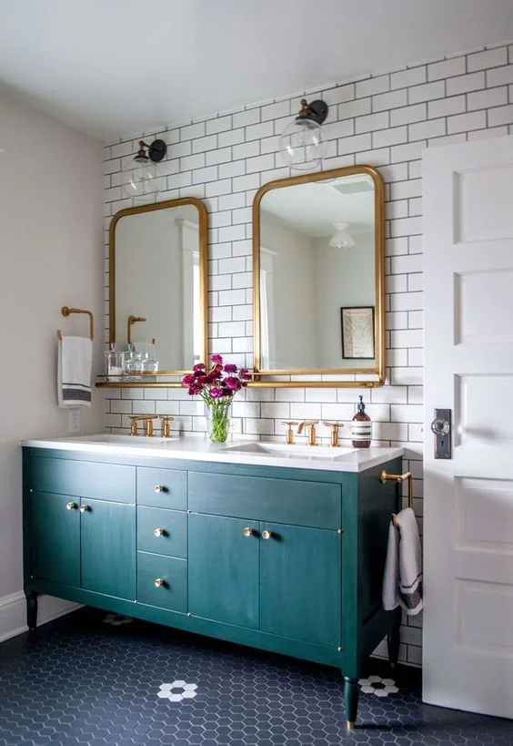 This bathroom is timeless and classic paired with black, white and brass finishes.