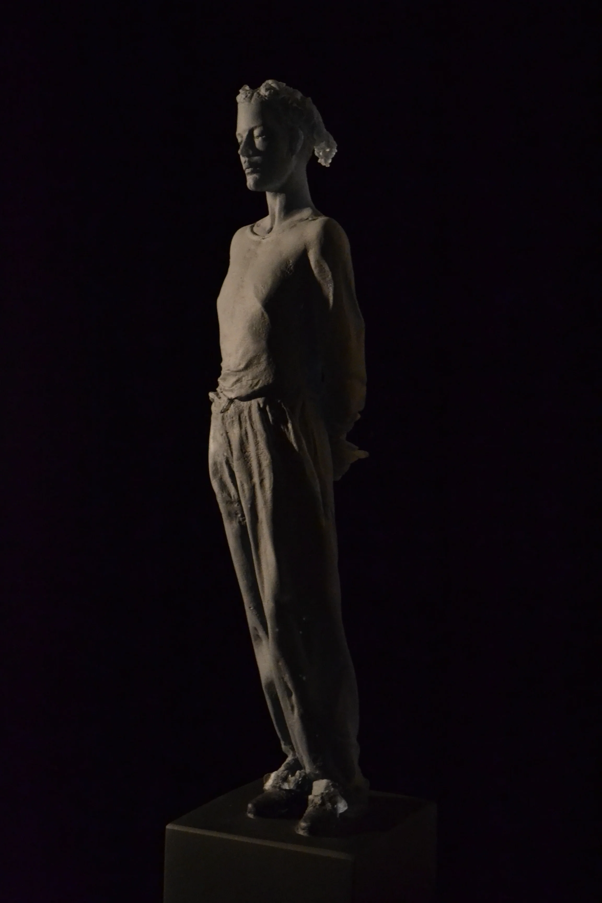 Untitled (arms behind back, bow tie shoes)