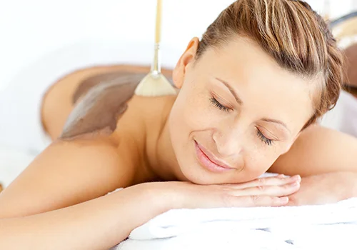 woman at bangkok day spa getting a body scrub treatment