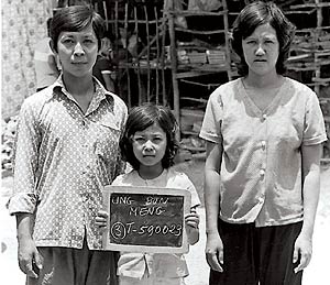  Loung Ung with her brother Meng Ung and sister-in-law Eang Tan in a refugee camp in Thailand 