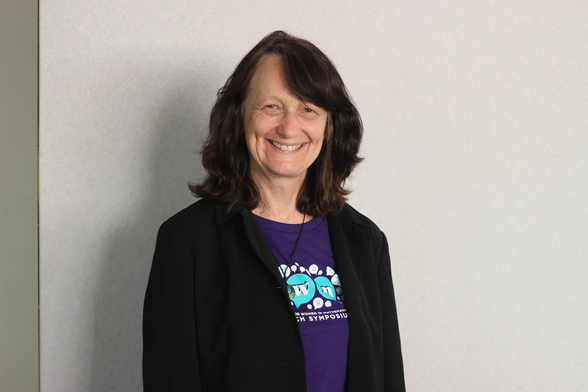 She is a mathematician and musician who specializes in the application of mathematics to medicine. She completed her undergrad studies as a single mother and is currently the president of the Association for Women in Mathematics.