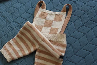 Tic-Tac-Toveralls by Ainur Berkimbayeva