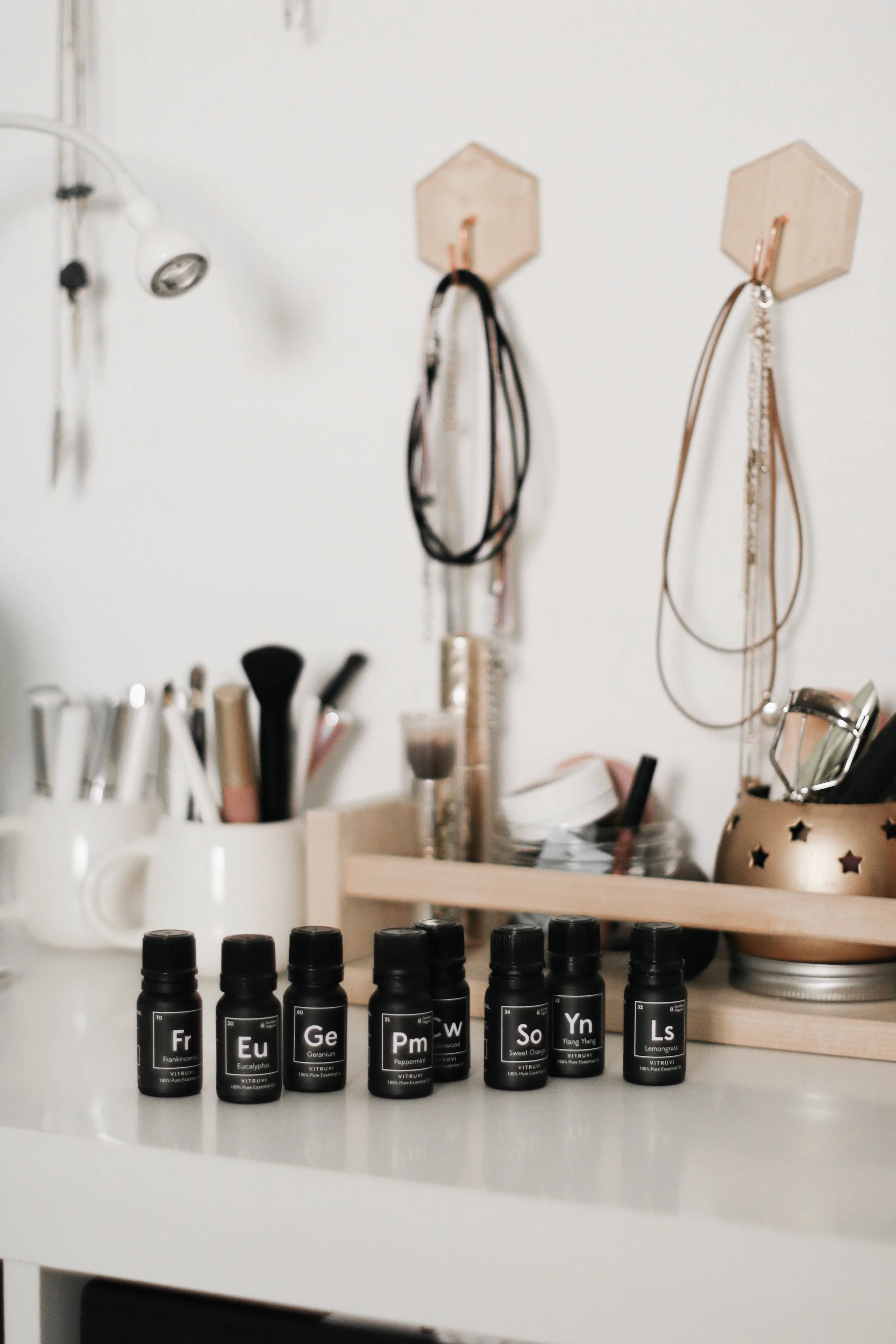 left to right: frankincense , eucalyptus , geranium , peppermint , cedarwood , sweet orange , ylang ylang , & lemongrass oils