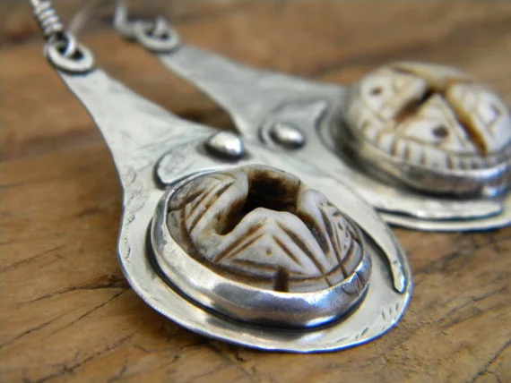 Sterling Silver Earrings set with Old Hand-Carved Conus Shells.jpg