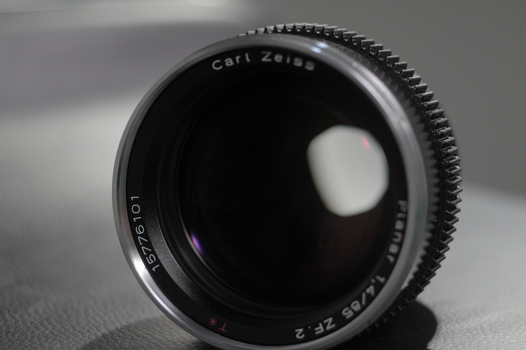 This is my Zeiss 85mm f/1.4 ZF mounted with a followfocusgears.com gear. Note how low profile the gear is.
