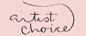 Artist Choice logo. A light pink background with stylized cursive lowercase lettering spelling "artist choice".