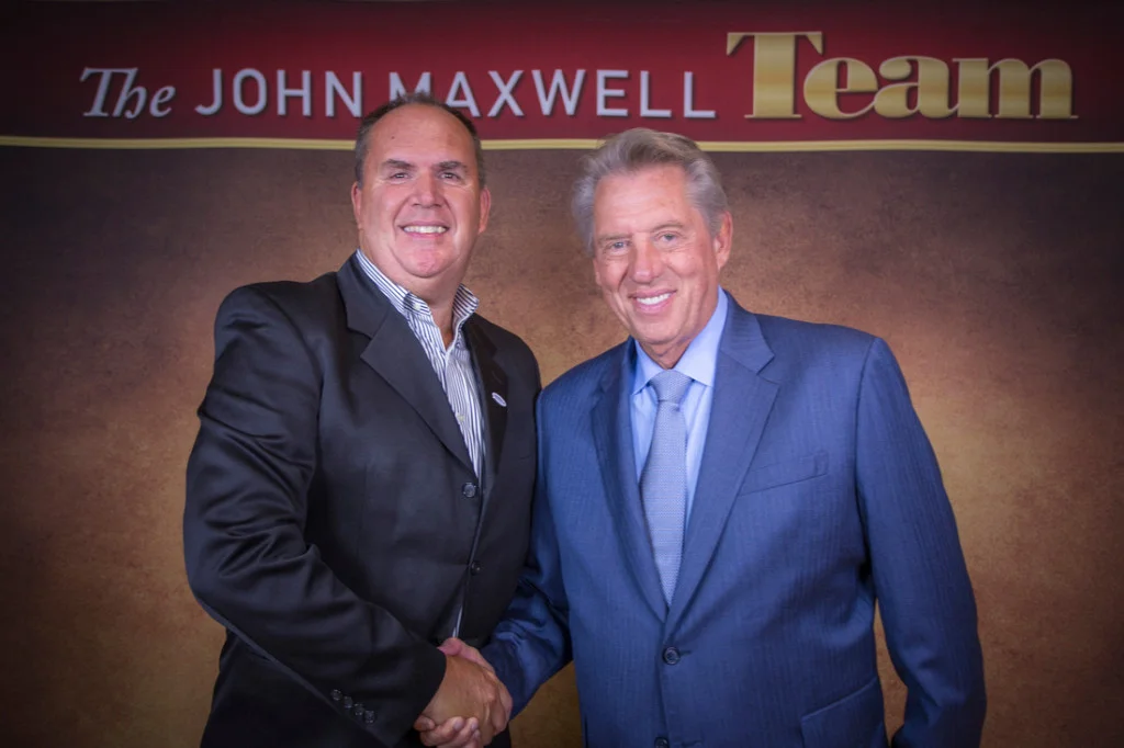 Jeff Raver, Begin to Win President, with his own personal coach and mentor John Maxwell.