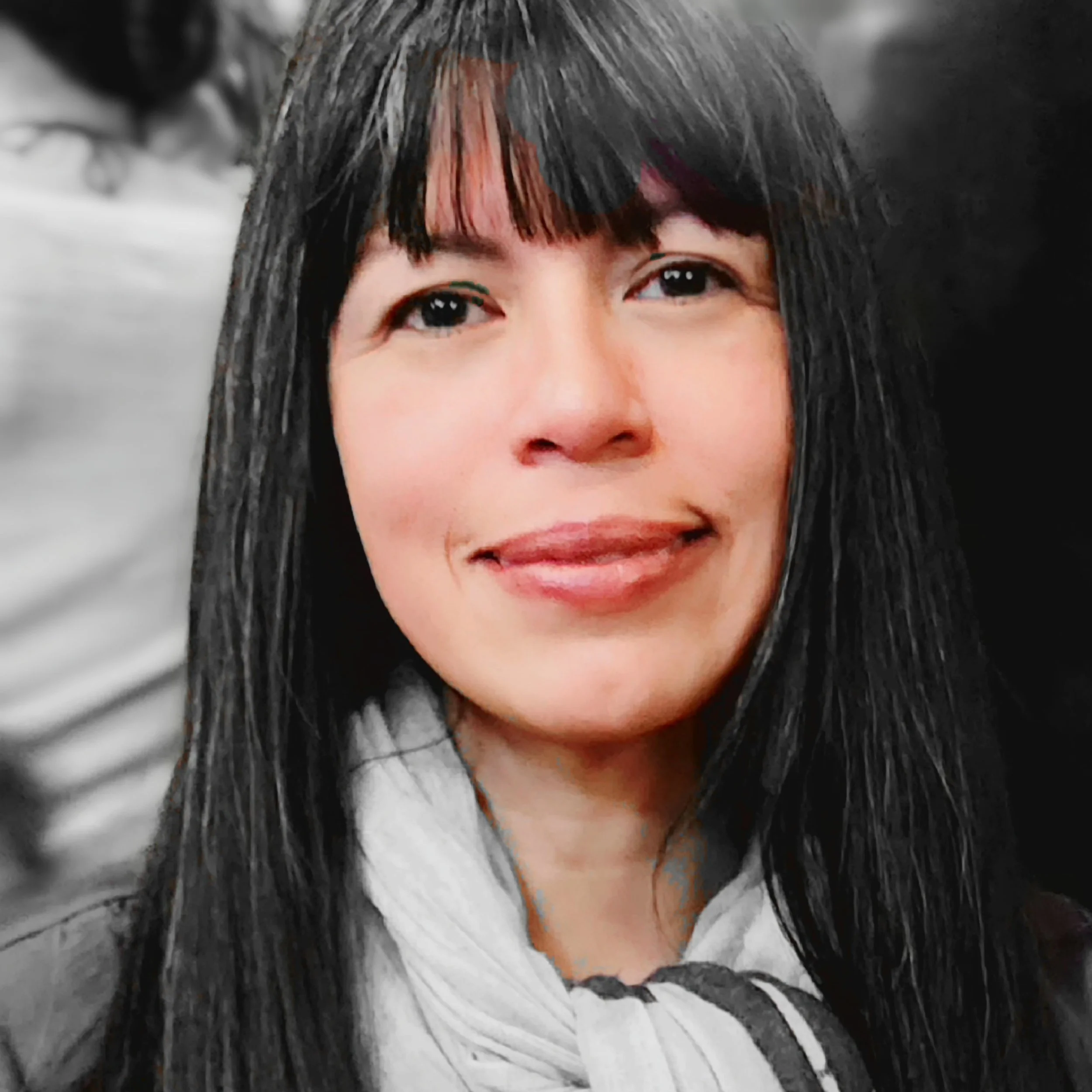 Gracie Bueno, licensed professional counselor and art therapist specializing in trauma-informed care, expressive arts therapy, and family mental health support throughout Colorado.