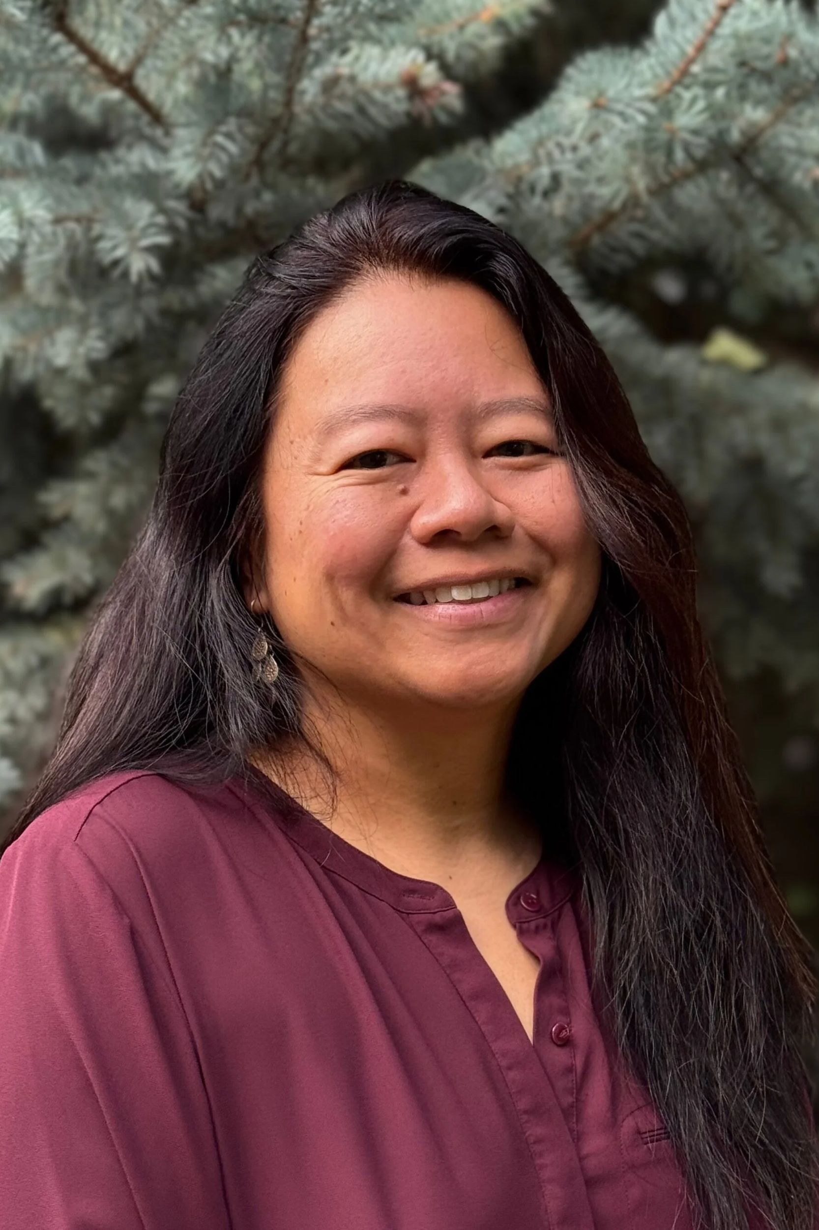 Yuri Shane, licensed clinical social worker providing therapy for individuals, families, relationship challenges, life transitions, and emotional wellbeing throughout Colorado.