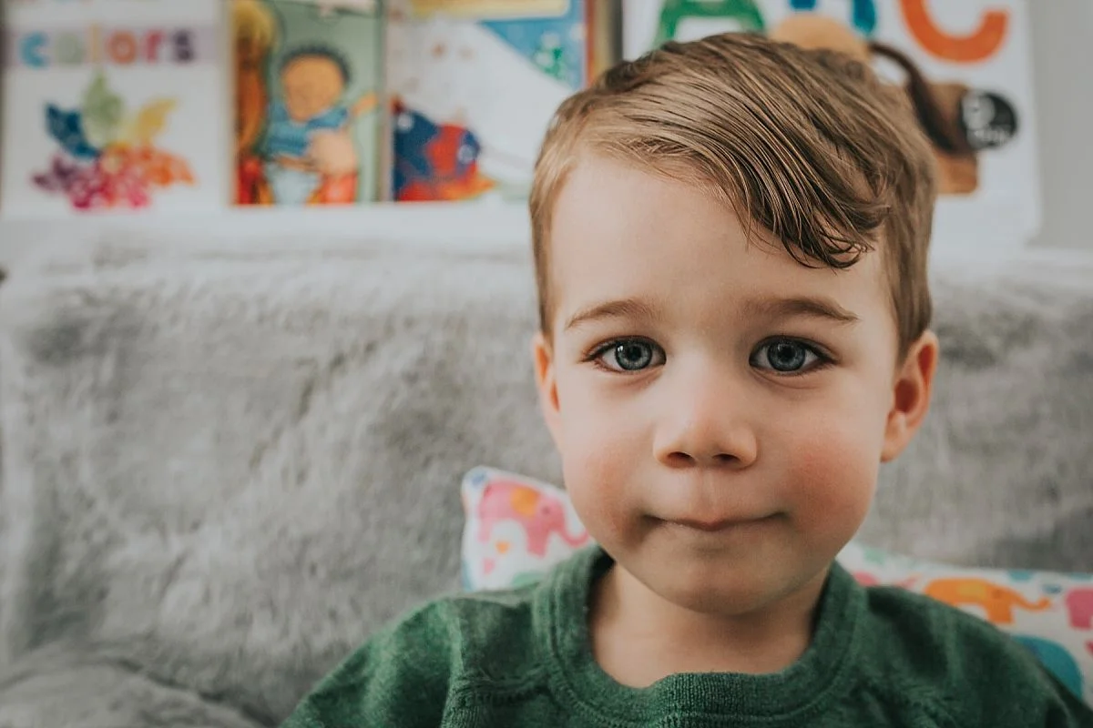 nyc family and newborn photographer toddler son and his amazingly beautiful blue eyes