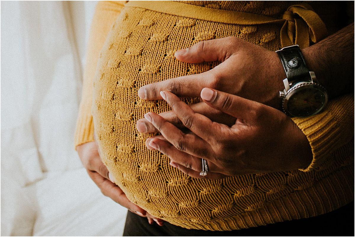 nyc family and newborn photographer close up of expecting mom's belly