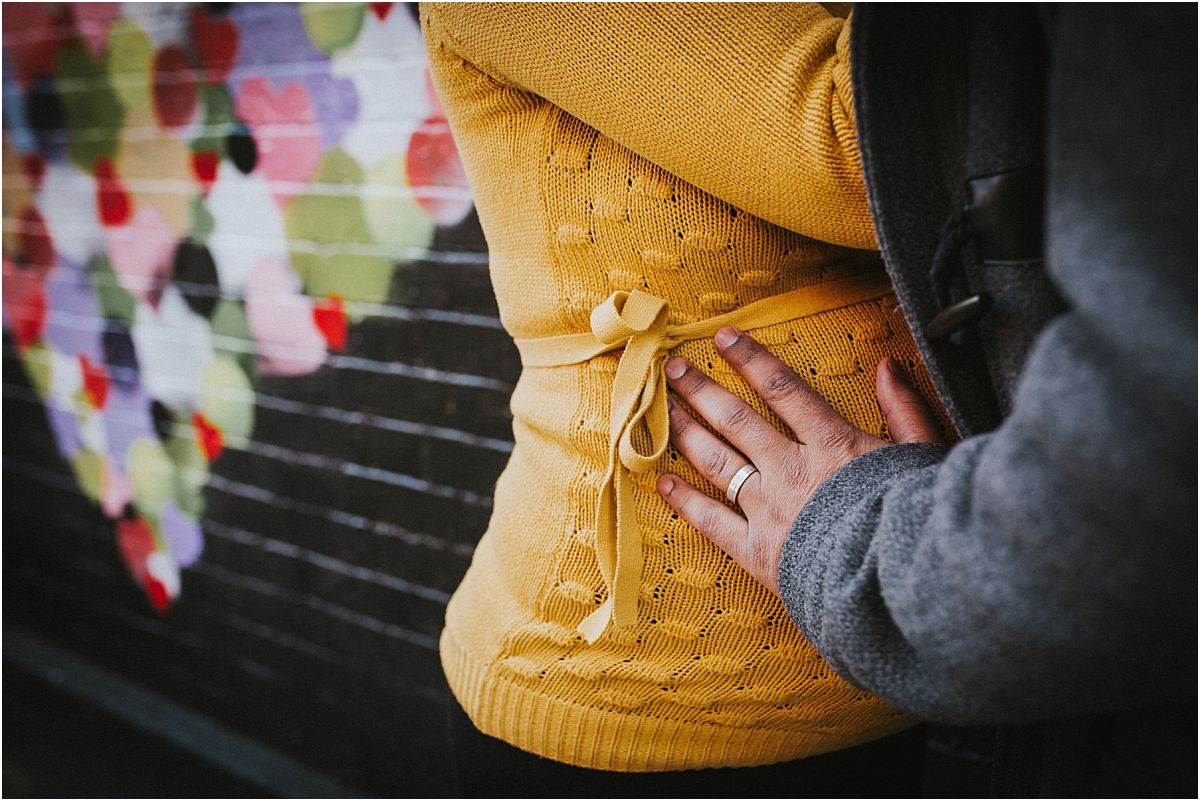 nyc family and newborn photographer close up of beautiful maternity bump in the East Village