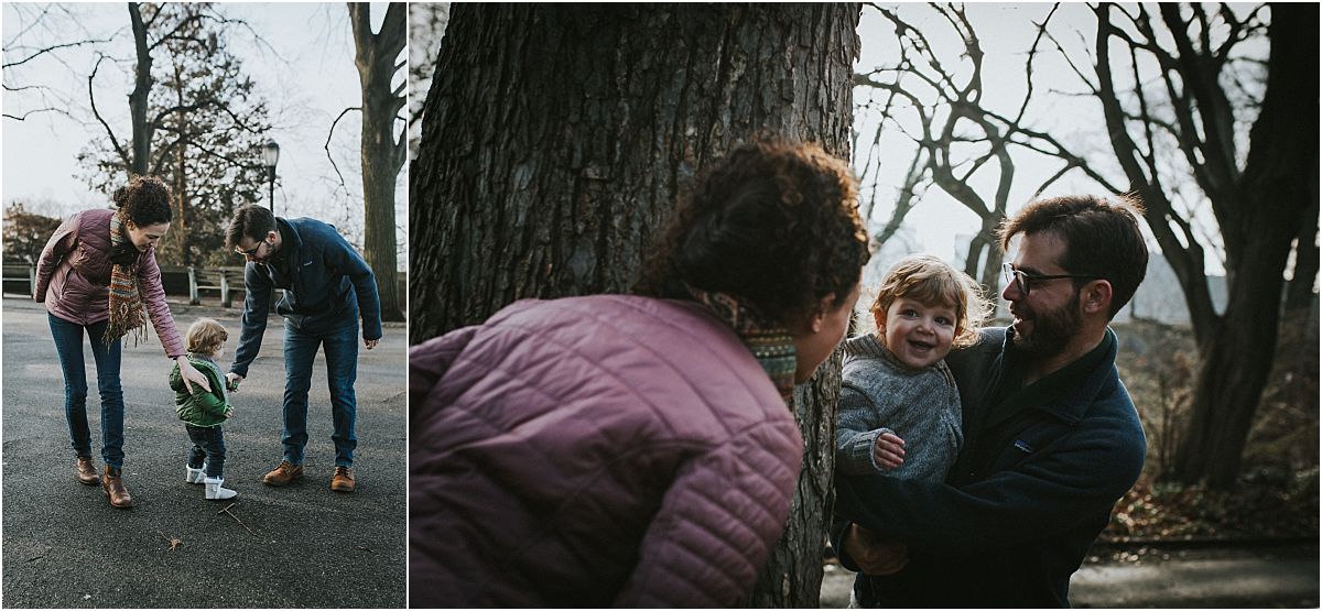 nyc family and newborn photographer mom and dad play peek-a-boo with toddler at nyc park bench in lifestyle family session