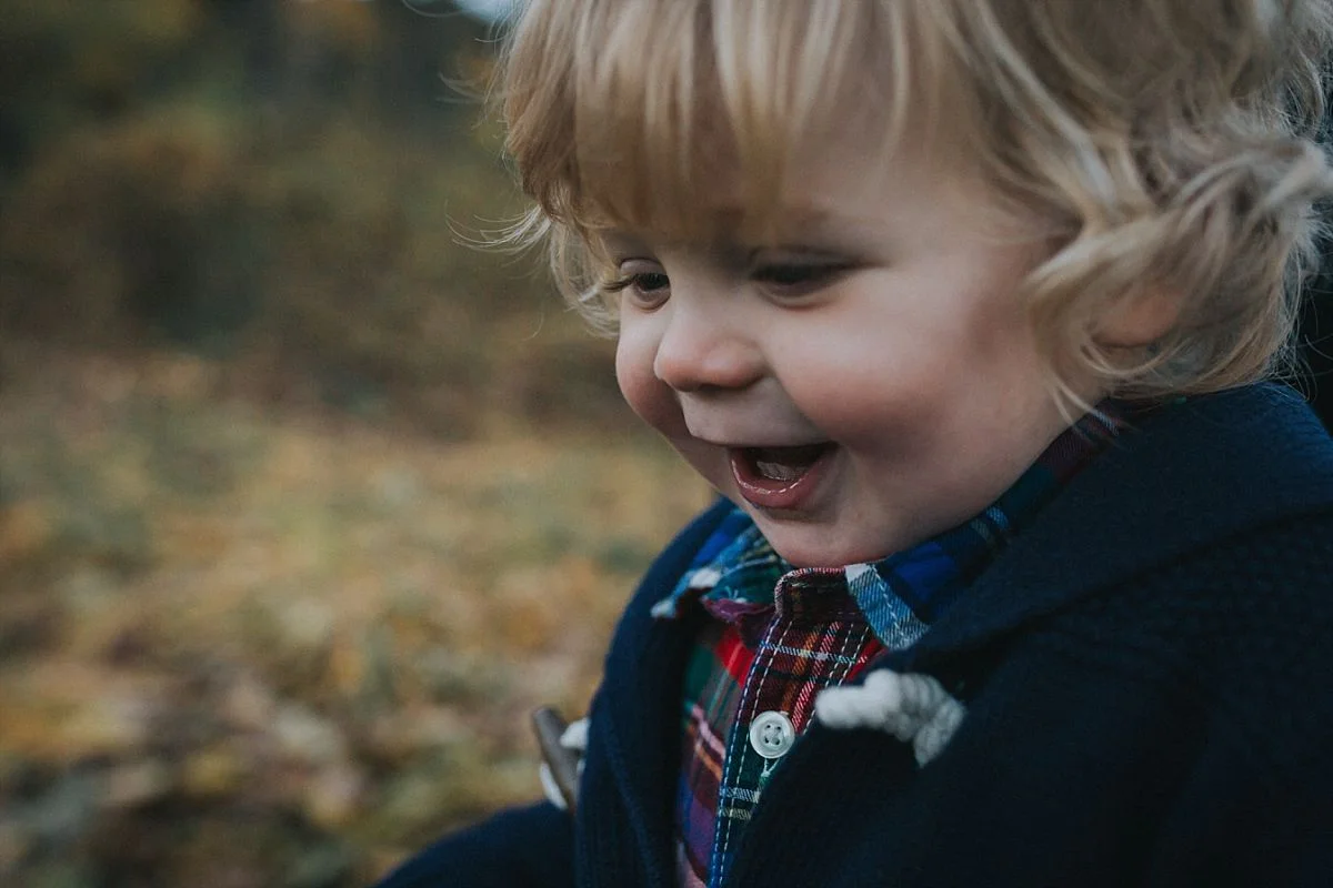 nyc family and newborn photographer lensbaby portrait close up of toddler boy in nyc park
